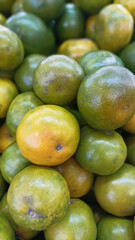 orange Fresh ripe juicy limes as background