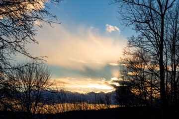 Obraz premium Cloud landscape against blue sky during sunset