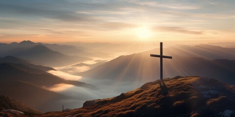 Obraz premium Cross on a mountain in ethereal clouds
