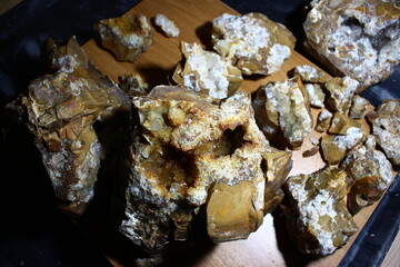 Fractured flint boulder with geodes and brushes of quartz and citrine inside
