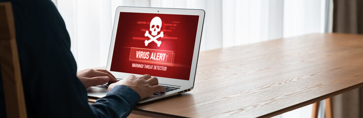 Virus warning alert on computer screen detected modish cyber threat , hacker, computer virus and...