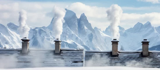 Gordijnen Chimneys of a chalet in the snowy Dolomites Alps © AkuAku
