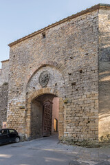Fototapeta na wymiar outer side of Fiorentina door, Volterra, Italy