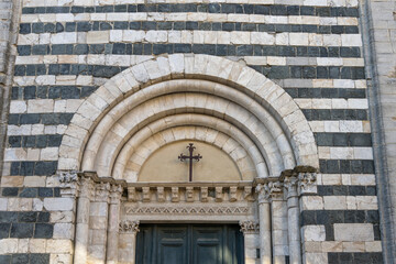 san Giovanni Battista baptistery ornated portal, Volterra, Italy