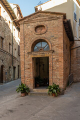 Fototapeta na wymiar san Cristoforo oratory facade, Volterra, Italy