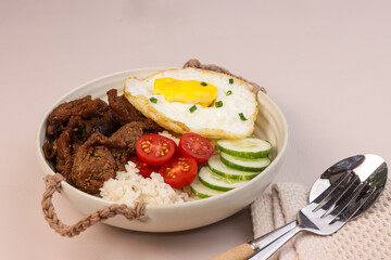 Beef Tapa, Tapsilog  is Filipino Traditional Beef Dish, Served with Egg and Garlic Fried Rice.