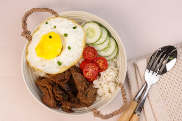 Beef Tapa, Tapsilog  is Filipino Traditional Beef Dish, Served with Egg and Garlic Fried Rice.