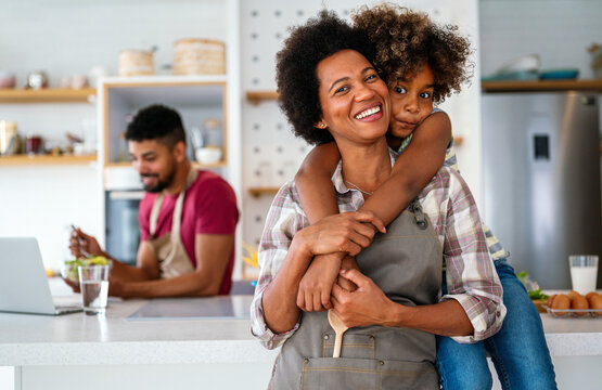 Caring African American Mother Hugging Teenage Daughter, Enjoy Moment Of Love, Motherhood Concept