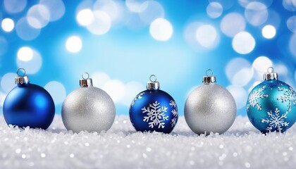 Blue christmas balls with snowflakes on bokeh background