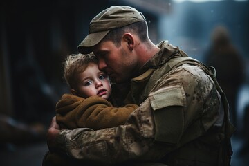 A soldier father hugs his little son outdoors, expressing love and care in a touching moment.
