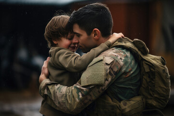 A soldier father in camouflage uniform embraces his son outdoors, celebrating a heartwarming reunion.