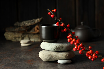 Asian tea concept, cup on dark background.