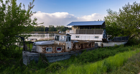 Fototapeta na wymiar Old boats on the bank of the Narew river, central Poland