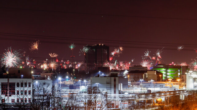 fireworks in the city skyline at night
