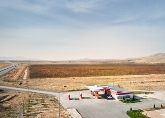 Gasoline station on the road in the desert