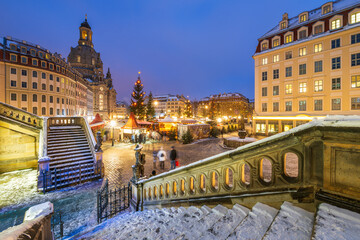 Traditional Christmas market called Weihnachtsmarkt on the Neumarkt square in Dresden Germany in blue hour.