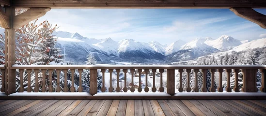 Rolgordijnen Cappuccino Wooden balcony with winter landscape views in a country house