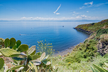 Cannitello beach seen from above with the Sicilian coasts in the background, Vulcano island - Aeolian islands archipelago IT  - 686585230