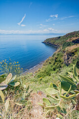 Cannitello beach seen from above with the Sicilian coasts in the background, Vulcano island - Aeolian islands archipelago IT - 686585254