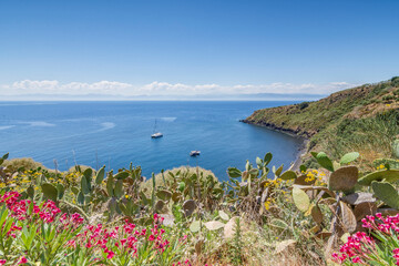 Cannitello beach seen from above with the Sicilian coasts in the background, Vulcano island - Aeolian islands archipelago IT - 686585451