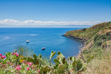 Cannitello beach seen from above with the Sicilian coasts in the background, Vulcano island - Aeolian islands archipelago IT - 686585480