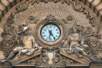 clock on the CEC Palace building in Bucharest