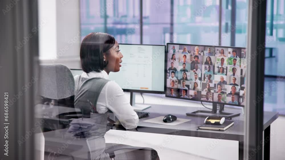 Aufkleber Watching multiple computer monitors in an office