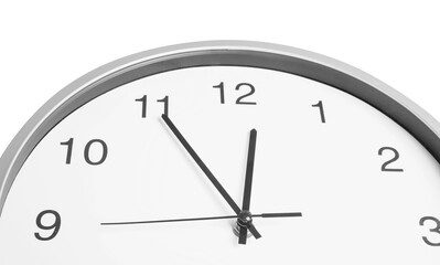 Clock showing five minutes until midnight on white background, closeup. New Year countdown