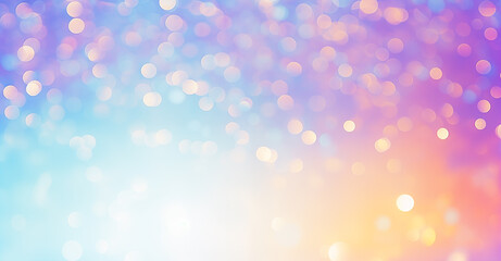 An abstract background with bokeh effect mad up of a cluster of blurred lights. Pastel blue, pink, orange, and white hues. Dreamy, festive and ethereal mood.