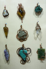 Handmade jewelry made of semi-precious natural stones - jaspers, agates, nephritis in copper frames