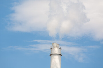 Thermal power plant stack emitting flue gases into the atmosphere
