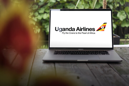 Uganda Airlines logo (UR, UGD), flag carrier of Uganda, displayed on MacBook Pro screen