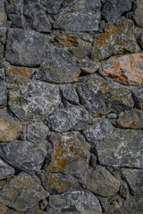fence made of real stone in large pieces as a background 2