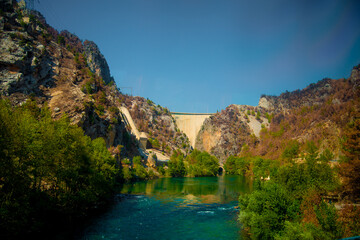 A water dam in the middle of a mountain range