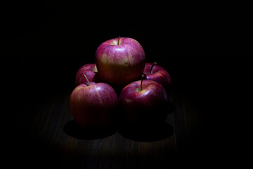 Fototapeta na wymiar apples on black