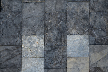 pavement path made of polished real stone as a background 3