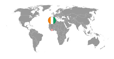 Pin map with Ivory Coast flag on world map. Vector illustration.