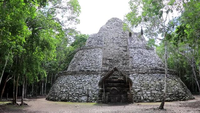 Coba Maya Ruins Xaibe building pyramid in tropical jungle Mexico.