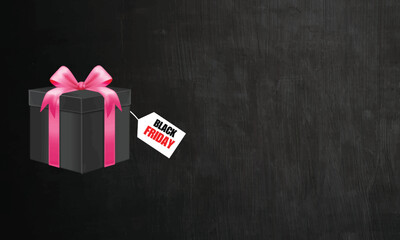 Black friday and pink ribbon black gift box with black friday sale offer.