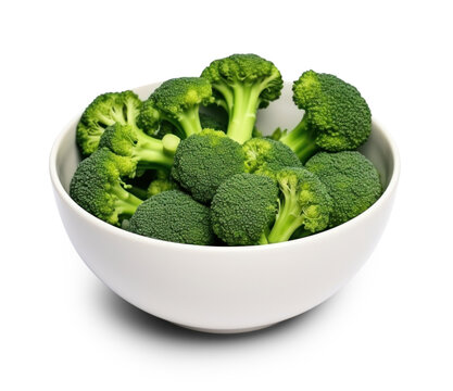 Fresh raw broccoli florets in a ceramic bowl isolated on white background.