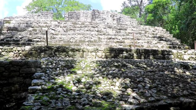 Coba Maya Ruins pyramids and ball game tropical jungle Mexico.
