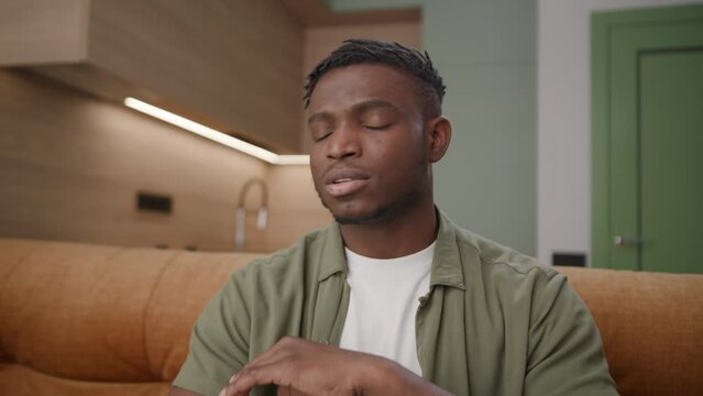 Black Man Saying 'No No' at Camera. African American man's denying or rejecting something. Listening lie looking at camera.