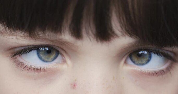 Girl looking into the camera rolling eyes