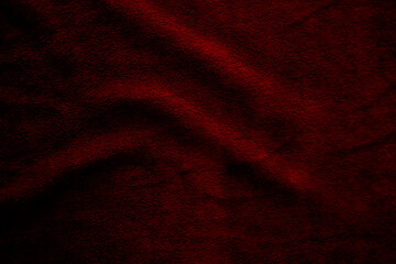 Blurred of dark red silk satin. Soft folds. Fabric. red luxury background. Space for design. Wavy lines. Banner. Flat lay, top view table. Beautiful. Elegant. Birthday, Christmas, Valentine's Day.