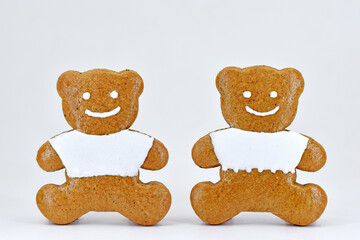 Cute gingerbread bears decorated with white icing 