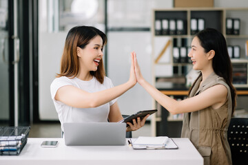 Fototapeta premium Business Show me the joy hi five hands With businesswomen executives celebrating the success of the company..
