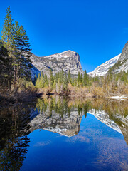 Mirror Lake reflection in water, Yosemite, California. Beautiful outdoor mountain nature landscape