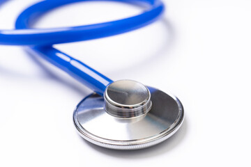 Blue stethoscope,object of doctor equipment for heartbeat trace,isolated on white background....