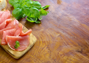 smoked ham of pork on a wooden board