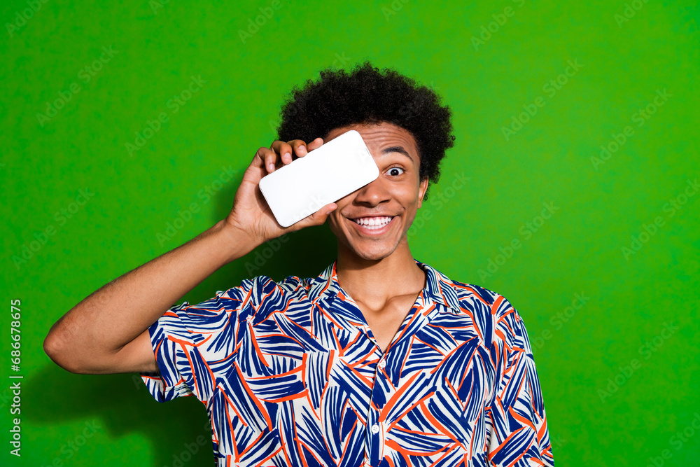 Canvas Prints Photo of shy funky man dressed print shirt modern gadget close eye empty space isolated green color background